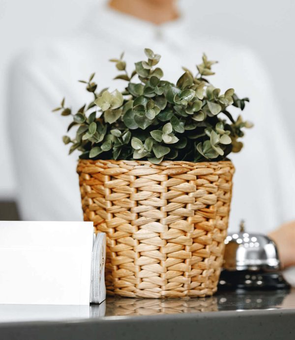 close-up-of-modern-hotel-reception-counter-desk-UCHL9TZ.jpg